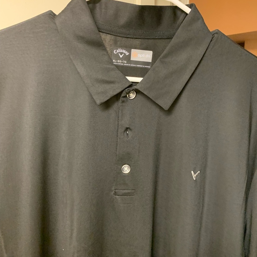 Never worn Callaway, black golf shirt. Dry fit XL